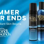 Advertisement banner for Bondi Sands: blue gradient with the slogan 'Summer Never Ends' and 'Where Radiant Skin Begins', showing two tanning products and a black mitt.