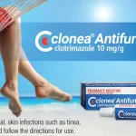Clonea Antifungal Cream ad on a beach showing the tube and box; feet in a hammock, sea and blue sky in the background; mentions clotrimazole 10 mg/g and treatment of fungal skin infections; read the label for directions.