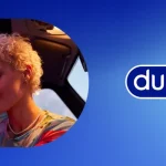 Couple kissing inside a car window cutout beside a blue gradient background with a Durex logo to the right.