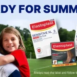 Man with a cheek bandage and smiling girl outdoors, advertising Elastoplast bandages and tape with the 'READY FOR SUMMER?' slogan.
