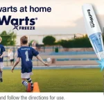 EndWarts Freeze ad showing a product box and applicator beside a group of kids playing soccer on a sunny field.