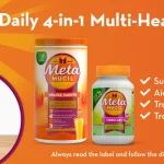 Advertisement for Meta Mucil Daily 4-in-1 Fibre with two supplement bottles and a glass of orange juice on an orange background; features list on the right.