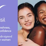 Purple Vagisil ad panel with logo and slogans on the left; three smiling women hugging on the right, conveying intimacy, confidence, and sisterhood.